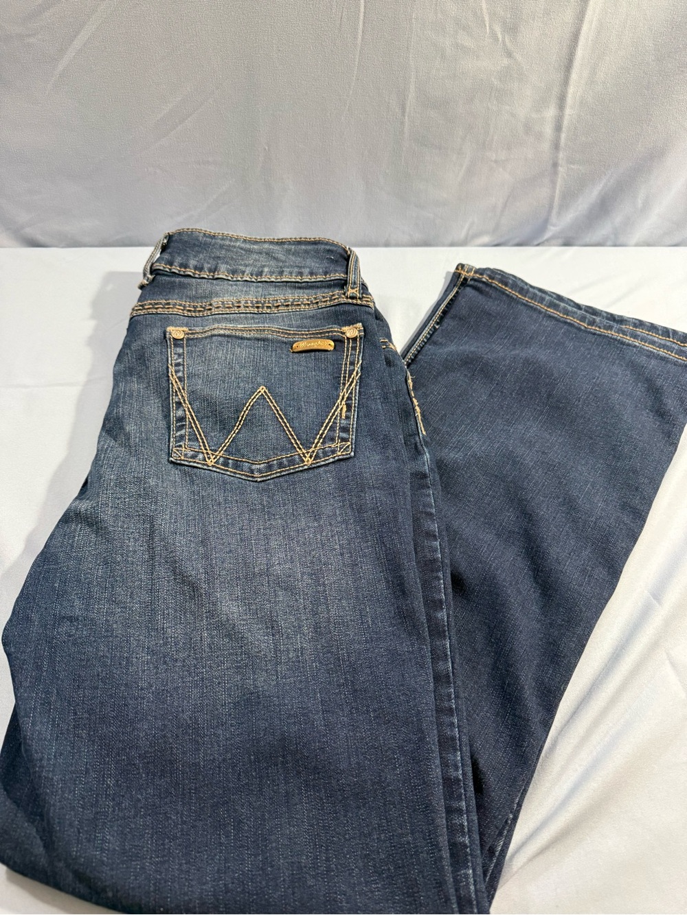 Wrangler Dark Blue Bootcut Jeans with Contrast Stitching
